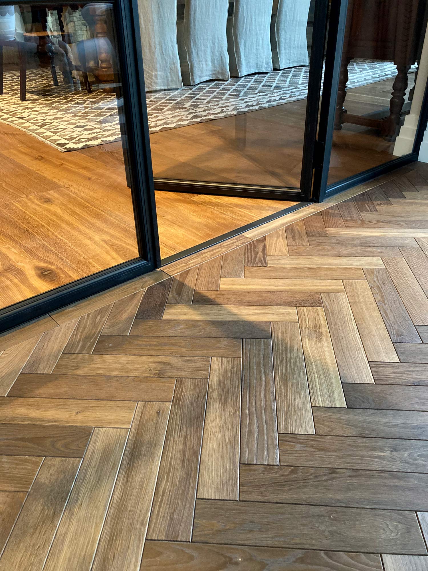 Wooden parquet flooring adjoing interior crittall door