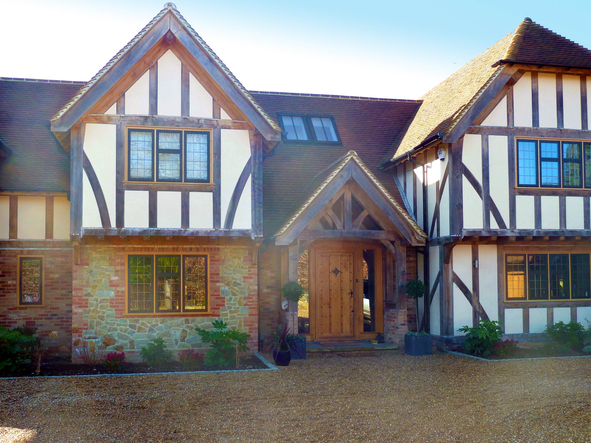 Exterior front view of new Oak Frame house - Castle Eaton Construction, Surrey