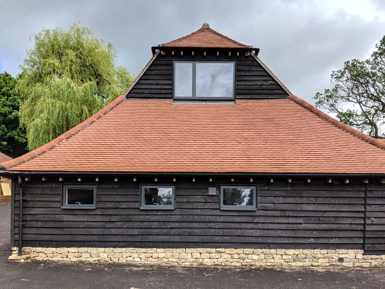 barn exterior after renovation - Castle Eaton Construction