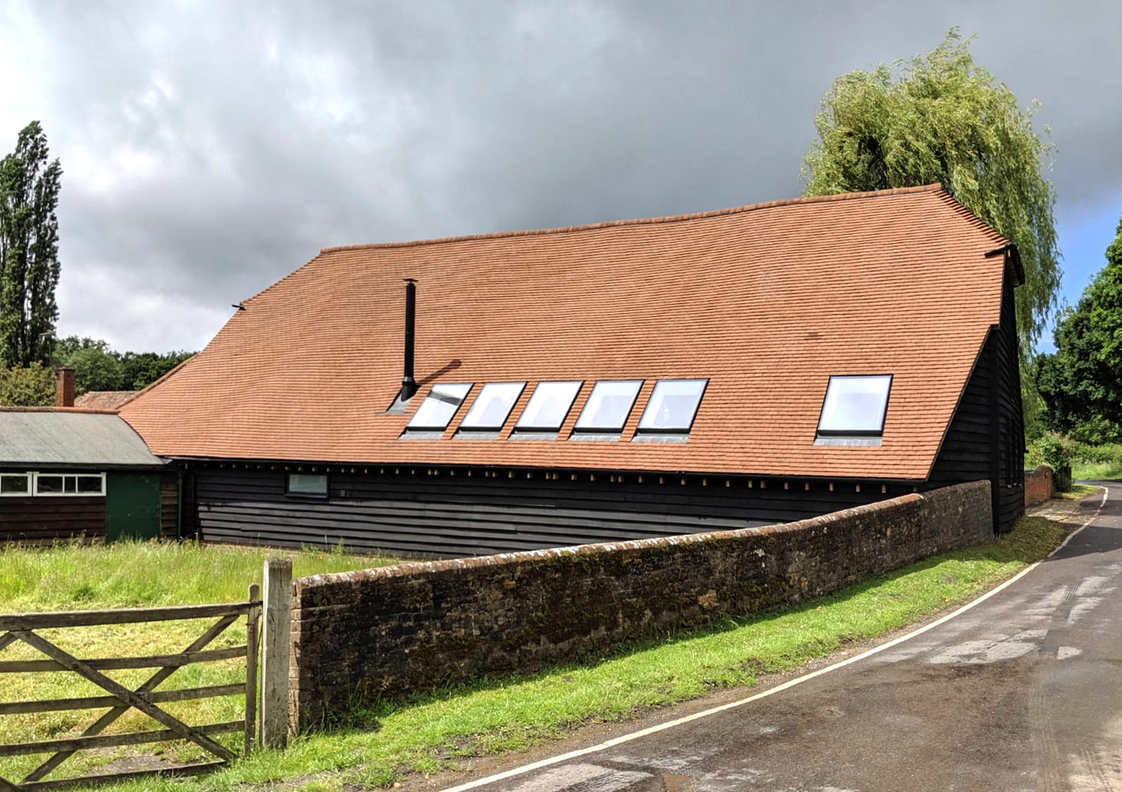 barn exterior after renovation - Castle Eaton Construction