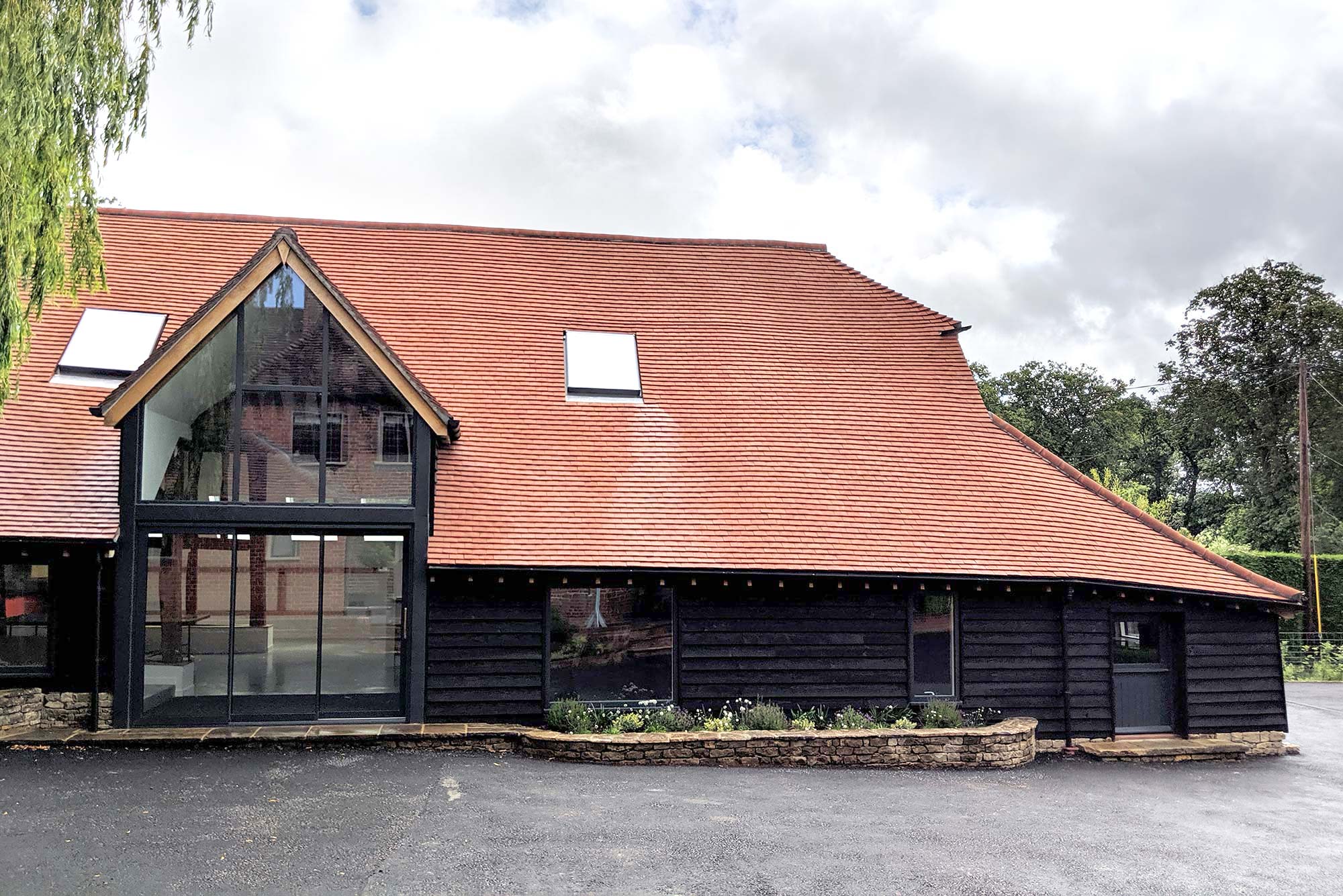 barn exterior after renovation - Castle Eaton Construction