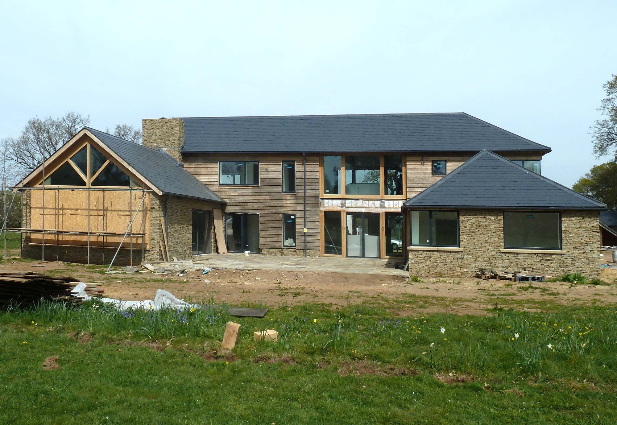 Rear view of house nearing completion - Castle Eaton Construction, Surrey